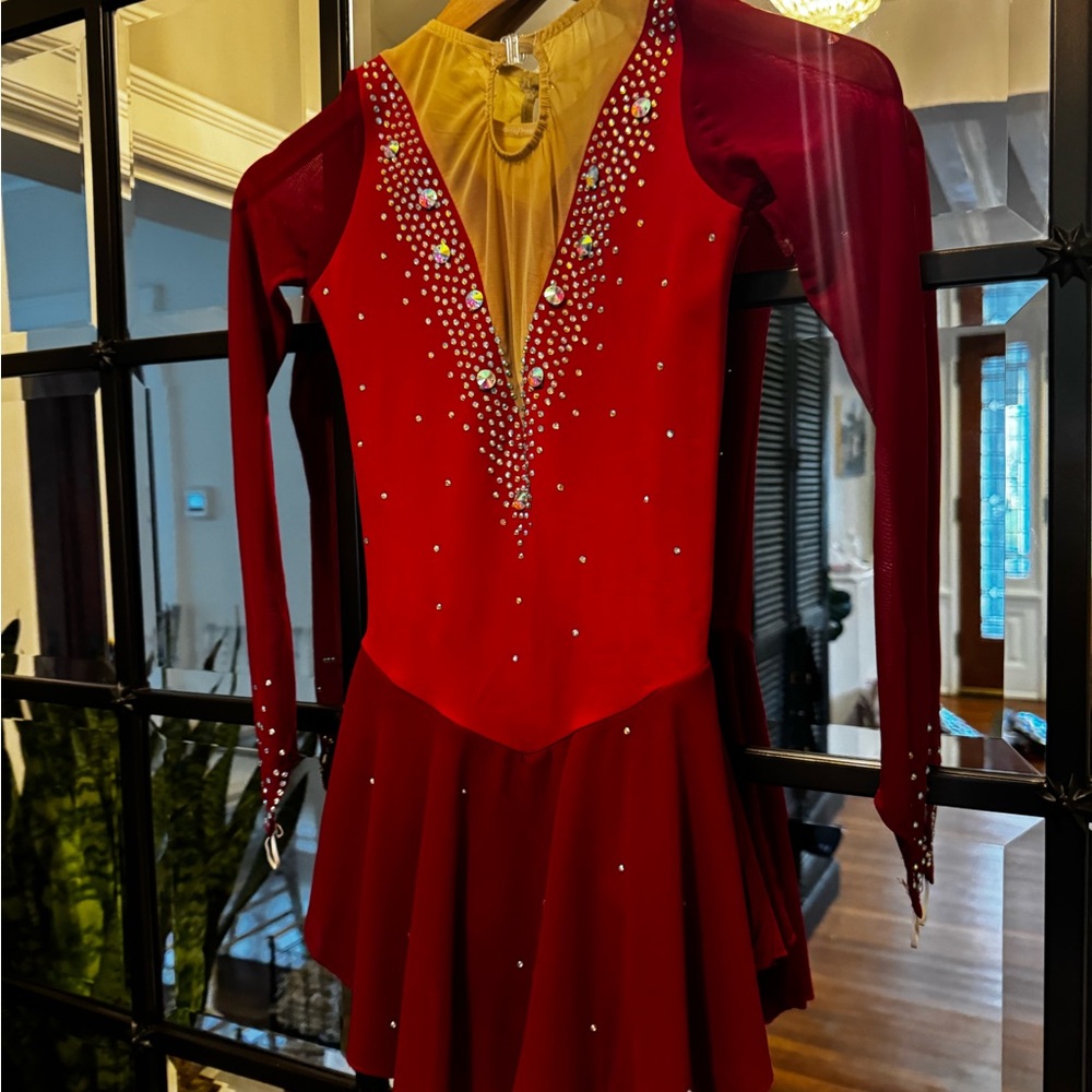 Red costume Crystal embellishment.